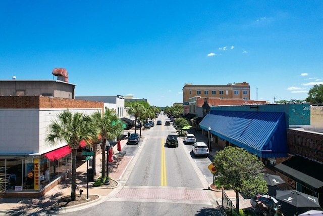 view of street featuring curbs and sidewalks