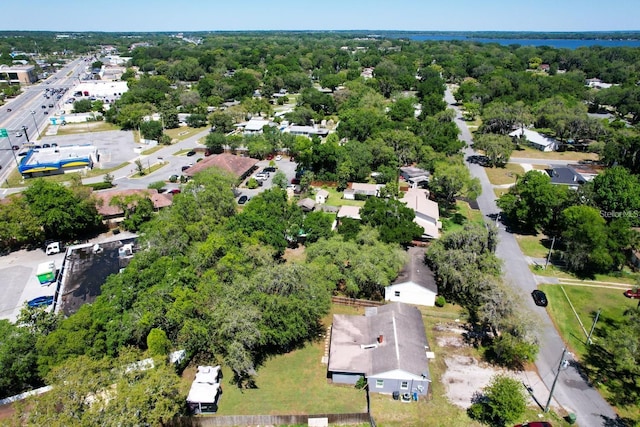 bird's eye view featuring a residential view and a view of trees