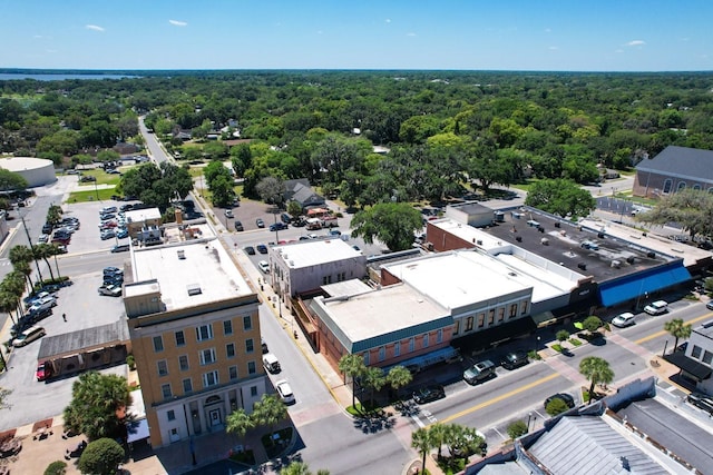 aerial view with a wooded view