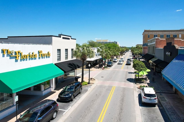 view of road featuring sidewalks and curbs