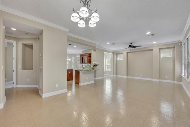 unfurnished living room with visible vents, baseboards, ornamental molding, and ceiling fan with notable chandelier