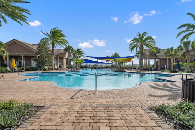 community pool featuring a patio