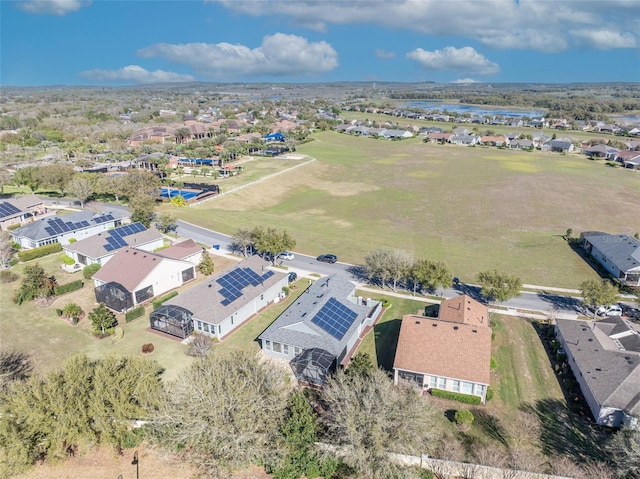 aerial view featuring a residential view and a water view