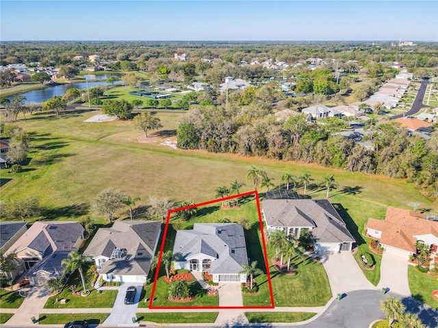 27023 Old English Ct, Leesburg, FL 34748 - aerial view of residential area with a large body of water and property parcel outlined