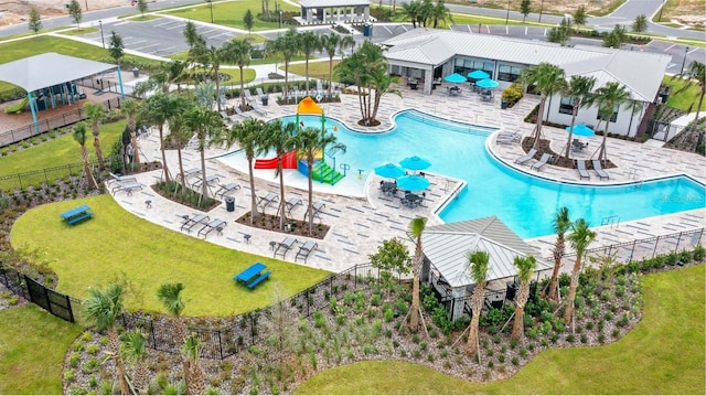 pool featuring a patio and fence