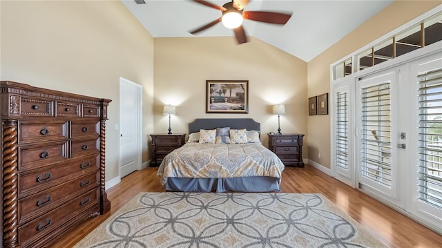 164 Nautica Mile Dr, Clermont, FL 34711 - bedroom with light wood-type flooring, lofted ceiling, baseboards, and access to exterior
