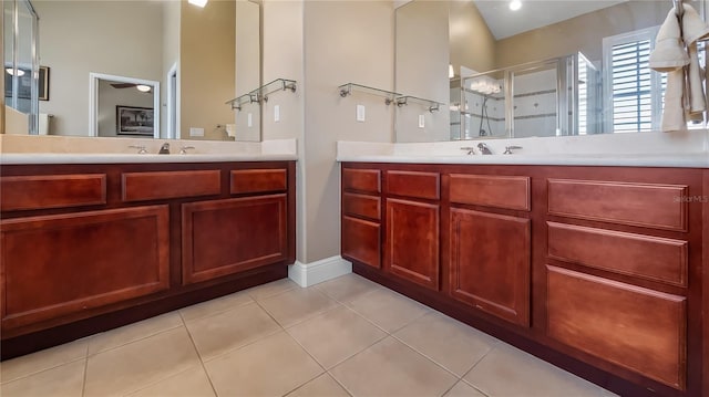 164 Nautica Mile Dr, Clermont, FL 34711 - bathroom with tile patterned floors, a stall shower, and vanity