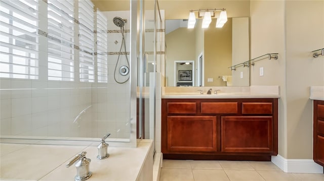 164 Nautica Mile Dr, Clermont, FL 34711 - bathroom with vanity, tile patterned floors, and tiled shower