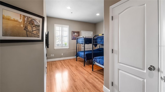 164 Nautica Mile Dr, Clermont, FL 34711 - bedroom with recessed lighting, light wood-type flooring, and baseboards