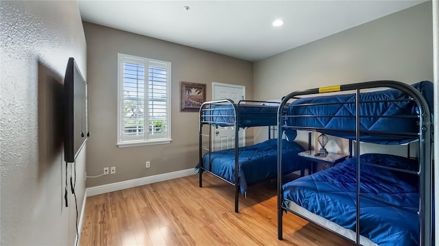 164 Nautica Mile Dr, Clermont, FL 34711 - bedroom with recessed lighting, wood finished floors, and baseboards