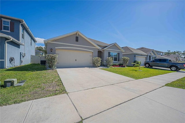 3719 Holly Grove Ln, Mount Dora, FL 32757 - ranch-style home with an attached garage, a front yard, driveway, central air condition unit, and stucco siding