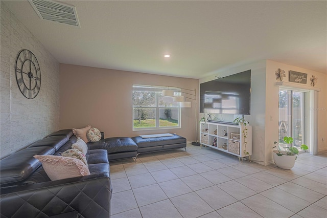 3719 Holly Grove Ln, Mount Dora, FL 32757 - living area with light tile patterned floors, healthy amount of natural light, baseboards, and recessed lighting