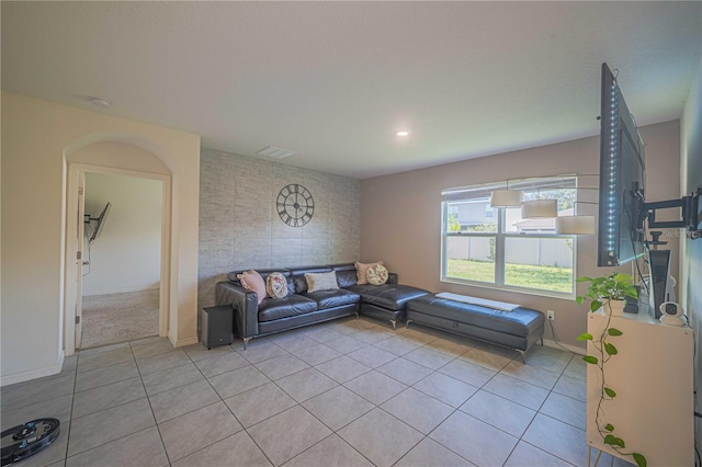 3719 Holly Grove Ln, Mount Dora, FL 32757 - living room with light tile patterned flooring, baseboards, and light carpet