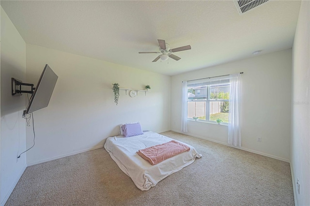 3719 Holly Grove Ln, Mount Dora, FL 32757 - carpeted bedroom with a ceiling fan and baseboards