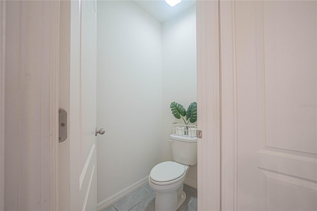 3719 Holly Grove Ln, Mount Dora, FL 32757 - bathroom with toilet and tile patterned floors