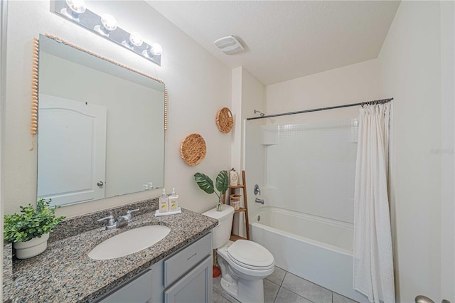 3719 Holly Grove Ln, Mount Dora, FL 32757 - bathroom featuring toilet, vanity, tile patterned floors, shower / bath combo, and a textured ceiling