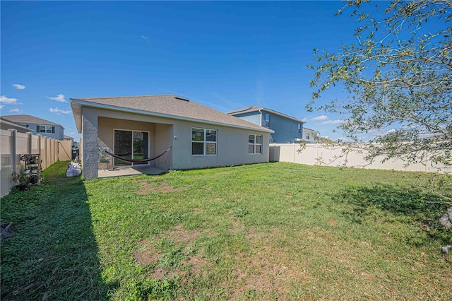 3719 Holly Grove Ln, Mount Dora, FL 32757 - rear view of house featuring stucco siding and roof with shingles