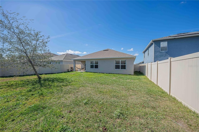 3719 Holly Grove Ln, Mount Dora, FL 32757 - rear view of property featuring stucco siding