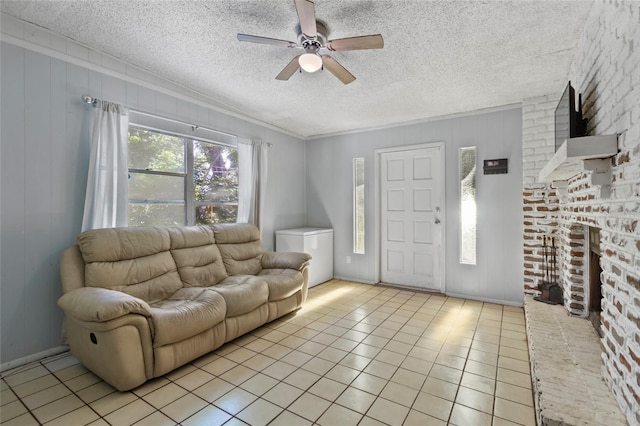3058 SE 3rd Ave, Ocala, FL 34471 - living area with brick wall, light tile patterned flooring, a fireplace, ceiling fan, and a textured ceiling