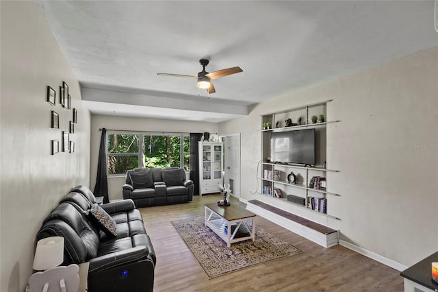 3058 SE 3rd Ave, Ocala, FL 34471 - living area featuring ceiling fan, baseboards, and wood finished floors