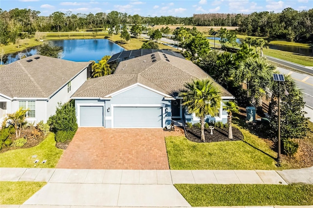 bird's eye view with a water view