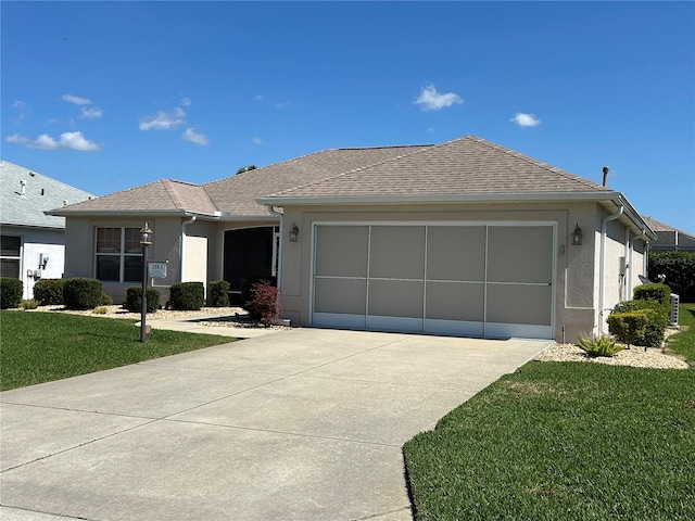 single story home featuring roof with shingles, stucco siding, a front lawn, concrete driveway, and a garage