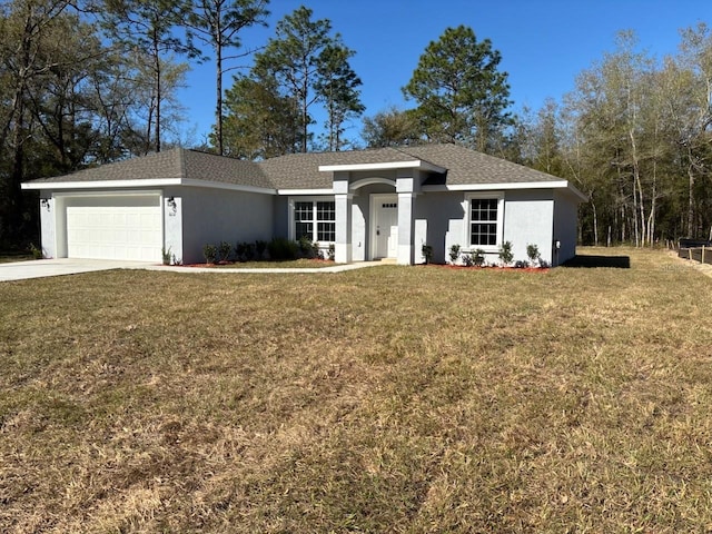 view of front of home with an attached garage, a shingled roof, stucco siding, a front lawn, and concrete driveway