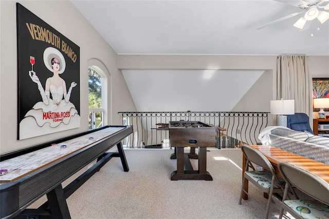 game room featuring lofted ceiling, a ceiling fan, and carpet floors