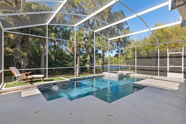 view of swimming pool with a fenced in pool, a lanai, and a patio area