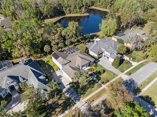 birds eye view of property with a residential view and a water view