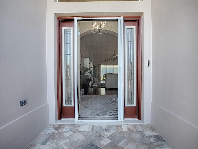 doorway to property with stucco siding