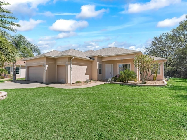 prairie-style home featuring a garage, a front yard, driveway, and stucco siding