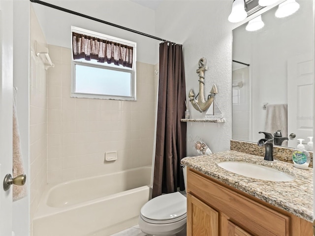 bathroom featuring toilet, shower / bathtub combination with curtain, vanity, and a textured wall