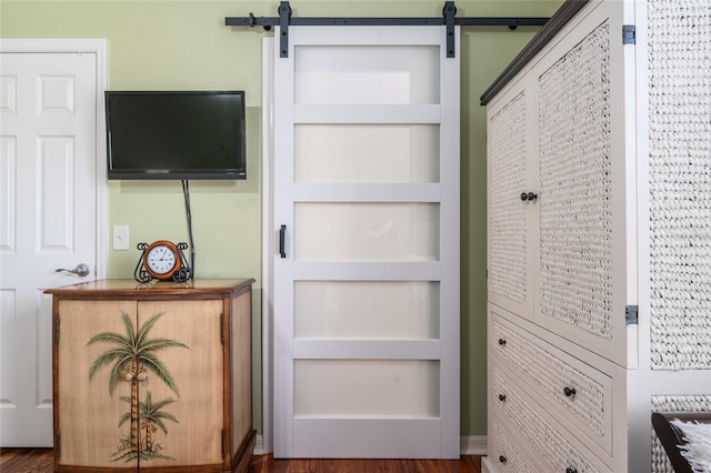 room details with a barn door and built in shelves