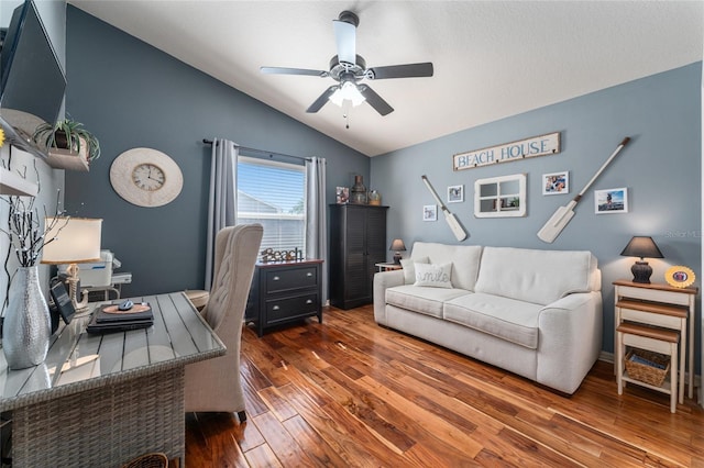 office with wood finished floors, ceiling fan, and vaulted ceiling