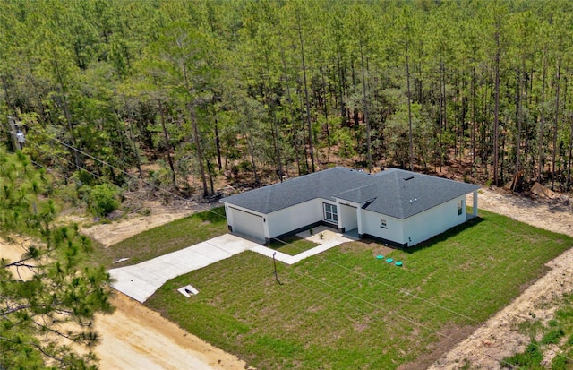 12444 SW 76th Ln, Dunnellon, FL 34432 - aerial view of property and surrounding area featuring a heavily wooded area