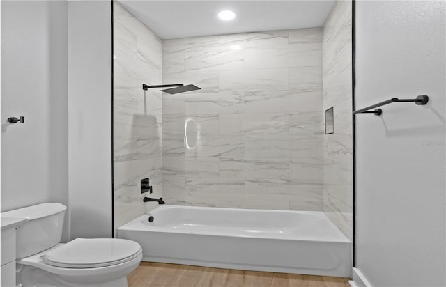 12444 SW 76th Ln, Dunnellon, FL 34432 - bathroom with wood finished floors and bathtub / shower combination