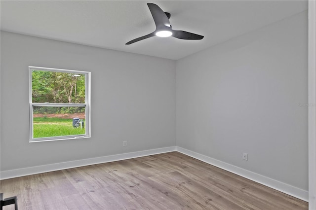 12444 SW 76th Ln, Dunnellon, FL 34432 - empty room featuring wood finished floors and ceiling fan