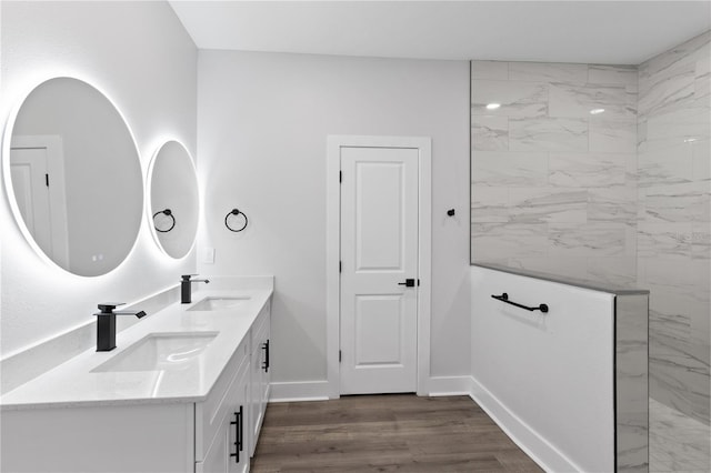 12444 SW 76th Ln, Dunnellon, FL 34432 - full bathroom featuring double vanity, walk in shower, and wood finished floors