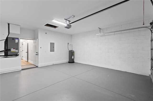 12444 SW 76th Ln, Dunnellon, FL 34432 - garage with a garage door opener, electric panel, electric water heater, concrete block wall, and heating unit