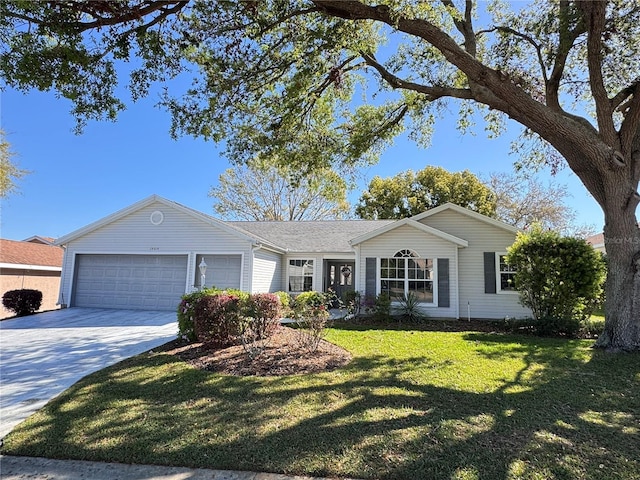 single story home featuring a front lawn, concrete driveway, and a garage