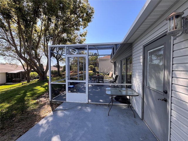 view of patio with a lanai