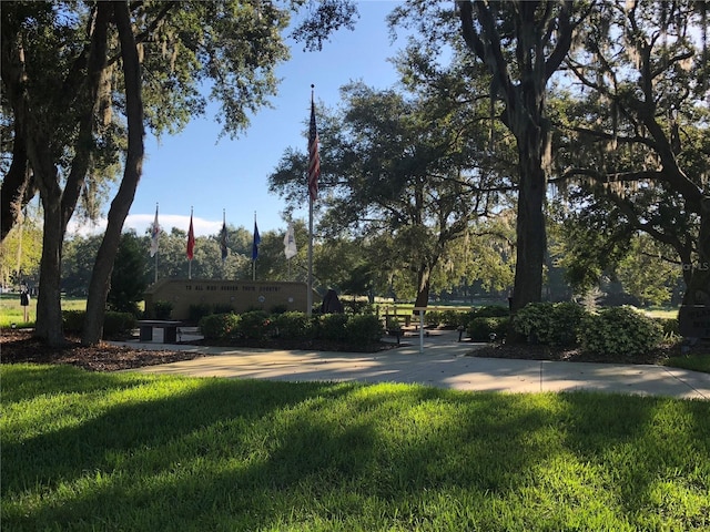 24614 Stillridge Ct, Leesburg, FL 34748 - view of property's community with a lawn