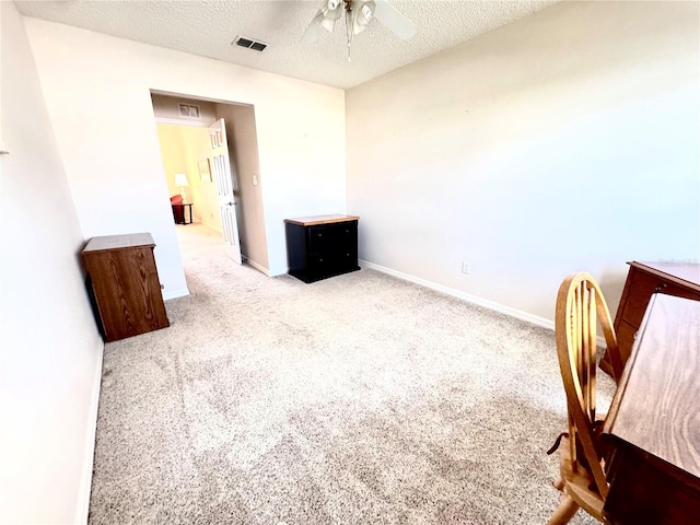24614 Stillridge Ct, Leesburg, FL 34748 - interior space featuring a textured ceiling, ceiling fan, baseboards, and visible vents
