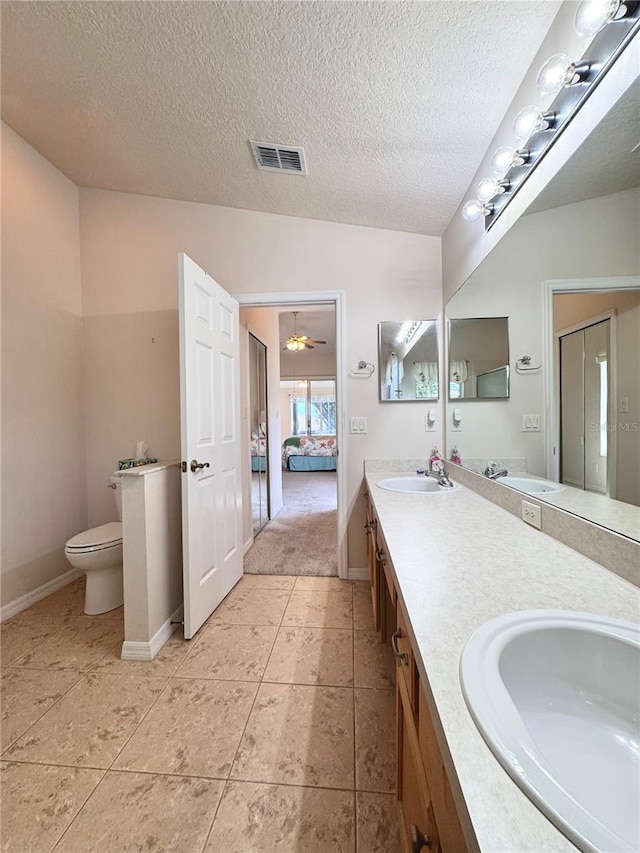 24614 Stillridge Ct, Leesburg, FL 34748 - full bathroom with double vanity, a sink, and toilet