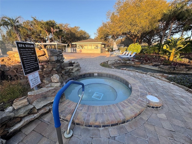 24614 Stillridge Ct, Leesburg, FL 34748 - view of pool featuring a patio area and a community hot tub