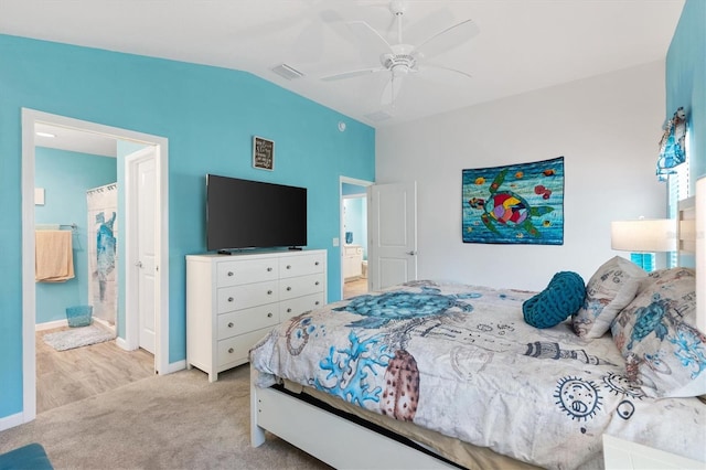 bedroom featuring a ceiling fan, baseboards, visible vents, vaulted ceiling, and carpet flooring