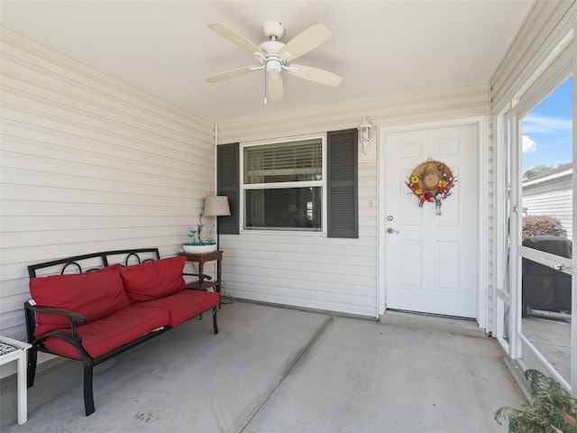 exterior space featuring ceiling fan