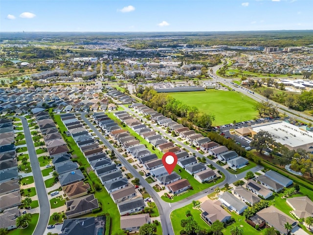 birds eye view of property with a residential view