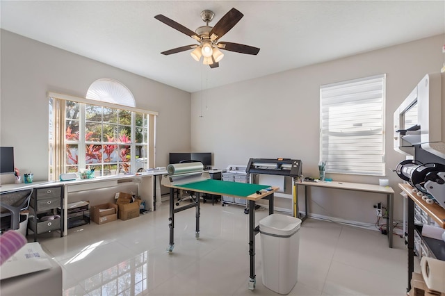 game room featuring tile patterned floors, plenty of natural light, and ceiling fan